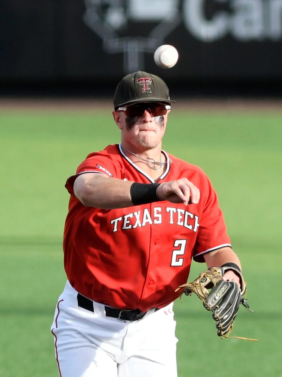 Texas Tech's infielder Jace Jung (2) throws the ball to first base against the Oklahoma, Friday, May 20, 2022, at Dan Law Field at Rip Griffin Park. 