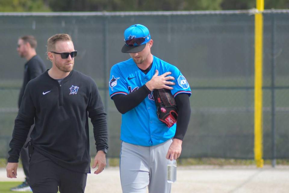 Miami Marlins left-handed pitcher Braxton Garrett walks off a back field at the Roger Dean Chevrolet Stadium complex with a training after a spring training workout in Jupiter, Florida, on Friday, Feb. 16, 2024. Jordan McPherson/jmcpherson@miamiherald.com