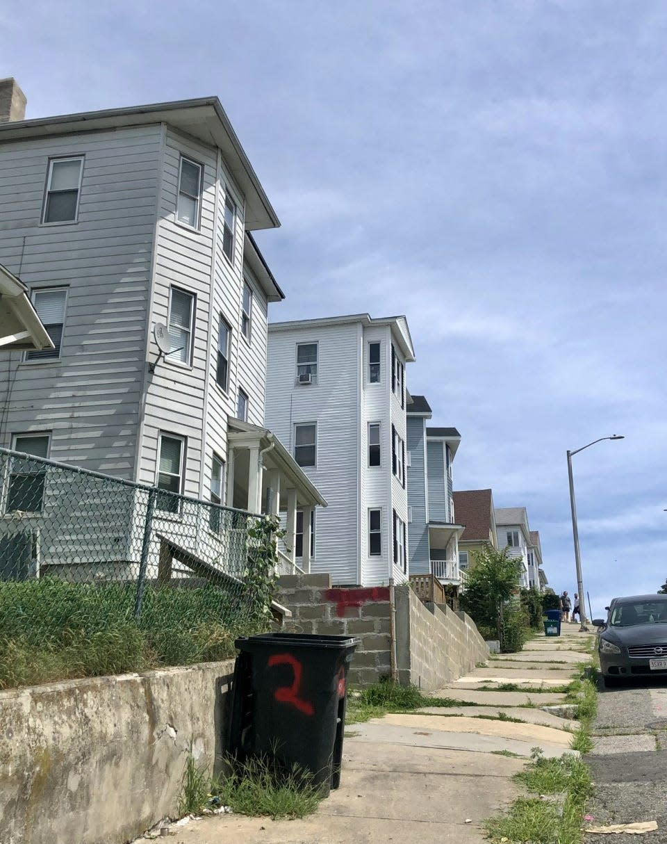 Much of the Vernon Hill neighborhood in Worcester is made up of triple-decker homes. In this area, the concrete, asphalt and poorly insulated older homes make for a hotter environment for residents.
