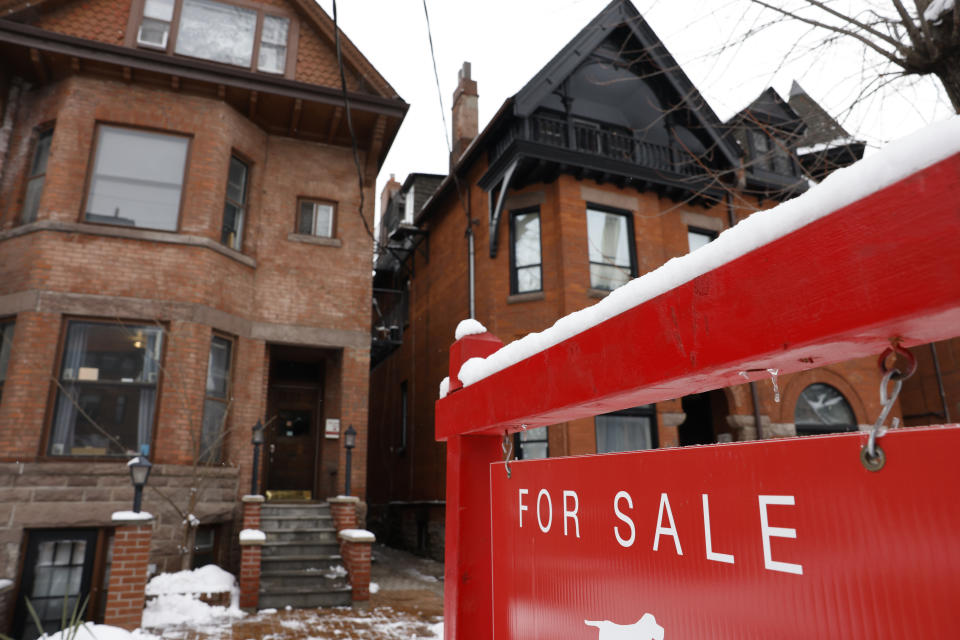 TORONTO, ON - March 13 - A FOR SALE sign is displayed outside a property on Madison Ave. in Toronto. Lance McMillan/Toronto StarMarch-13-2023        (Lance McMillan/Toronto Star via Getty Images)