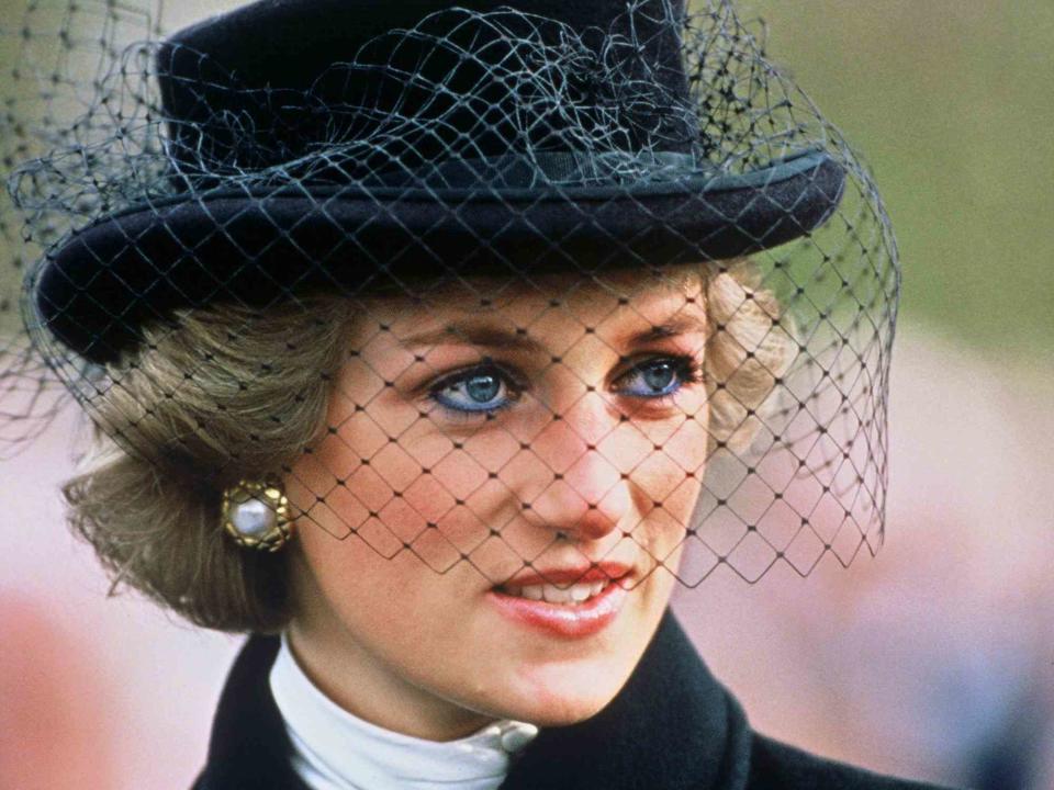 <p>Anwar Hussein/Getty</p> Diana, Princess of Wales attends a service commemorating the 70th anniversary of the armistice, at the Arc de Triomph on November 11, 1988 in Paris, France. 