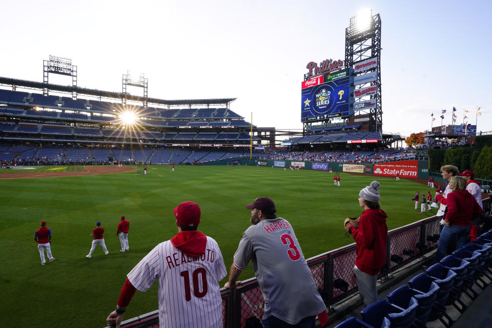 Fans watch during batting practice before Game 3 of baseball's World Series between the Houston Astros and the Philadelphia Phillies on Tuesday, Nov. 1, 2022, in Philadelphia. (AP Photo/Matt Rourke)