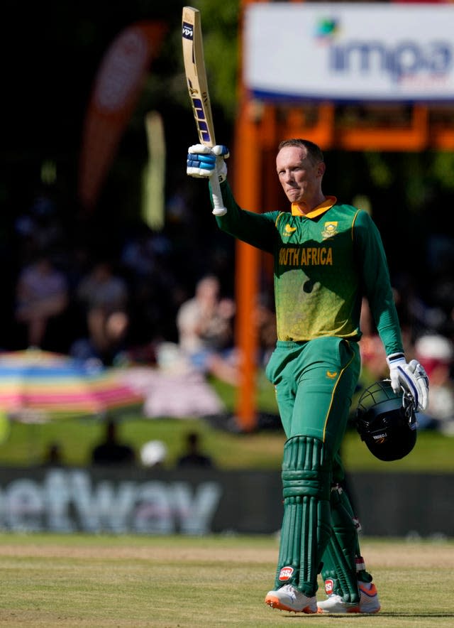 Rassie Van Der Dussen raises his bat after scoring his century