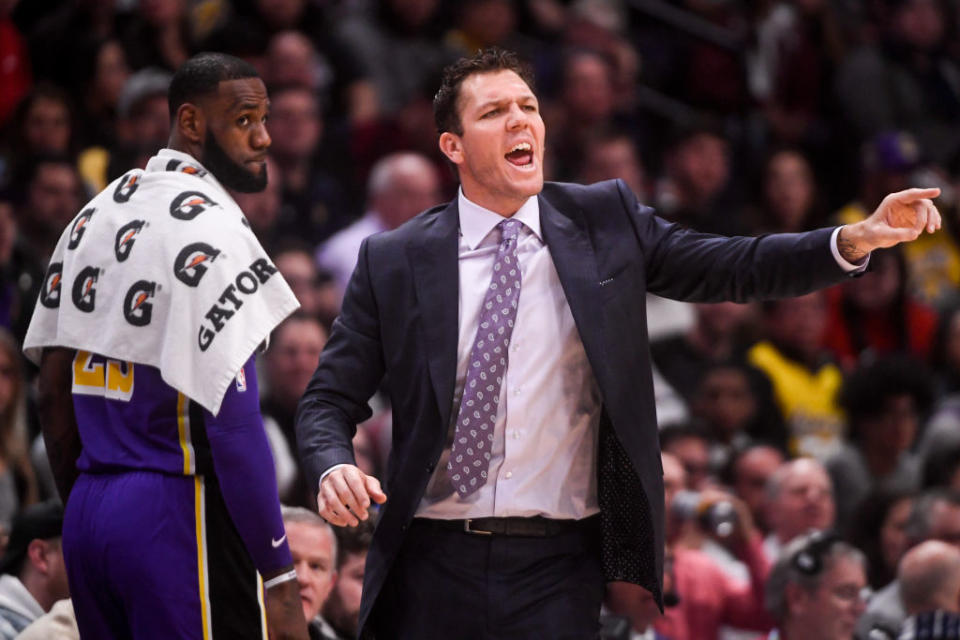 LeBron James keeps a close eye on Lakers coach Luke Walton’s play calling. (Getty Images)