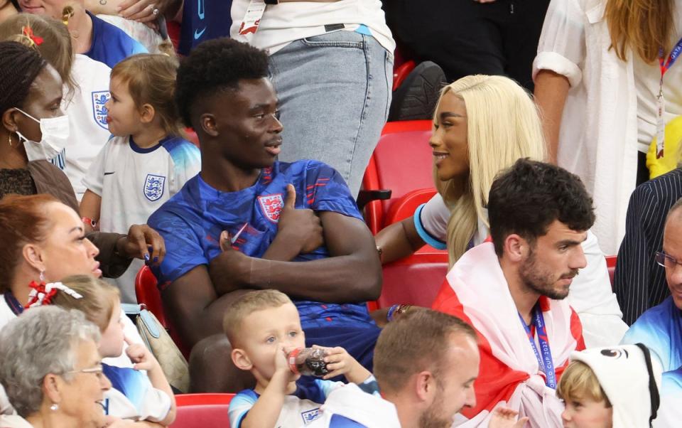 Saka with his girlfriend Tolami Benson during the 2022 World Cup in Qatar (Getty Images)