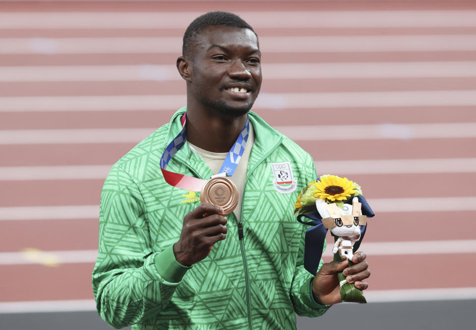 Hugues Fabrice Zango holds bronze medal for Men's Triple Jump