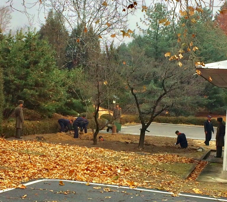 North Korean workers appear to be digging near the spot where a soldier made a dash across the border earlier this month