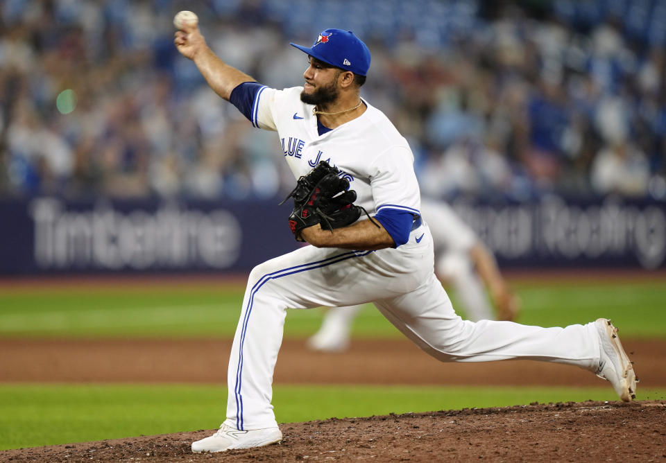 Toronto Blue Jays relief pitcher Yimi Garcia (93) works against the San Francisco Giants during the ninth inning of a baseball game in Toronto, on Wednesday, June 28, 2023. (Frank Gunn/The Canadian Press via AP)