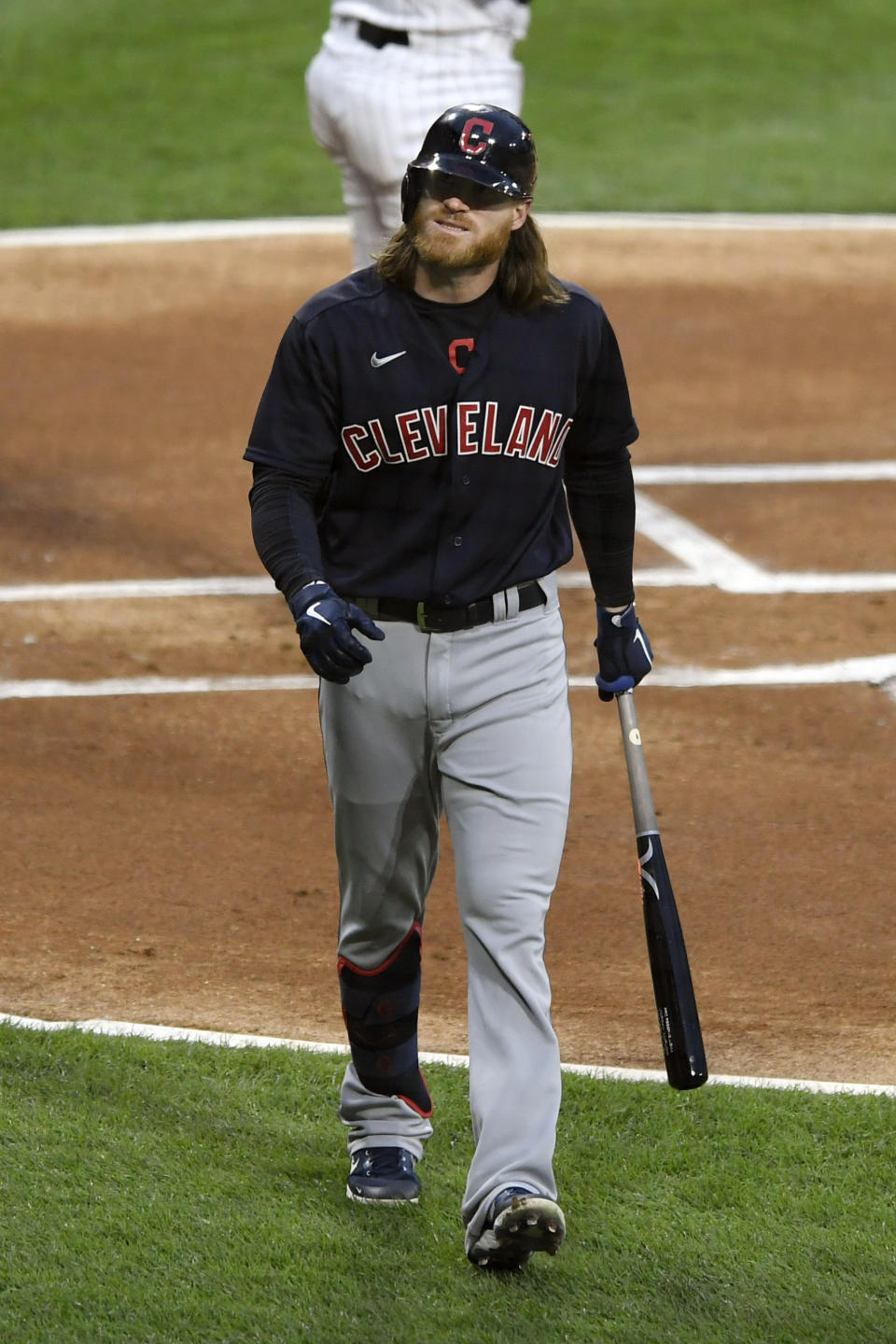 Cleveland Indians' Ben Gamel reacts after striking out during the first inning of a baseball game against the Chicago White Sox Tuesday, April 13, 2021, in Chicago. (AP Photo/Paul Beaty)