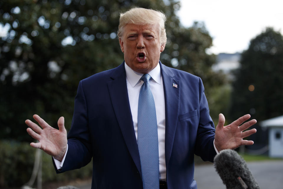 President Donald Trump talks to reporters on the South Lawn of the White House, Friday, Oct. 4, 2019, in Washington. (AP Photo/Evan Vucci)