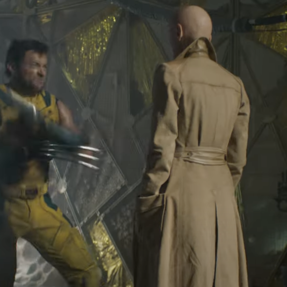 Wolverine in a combat stance facing a bald adversary in a long coat, both in a dimly lit, futuristic setting