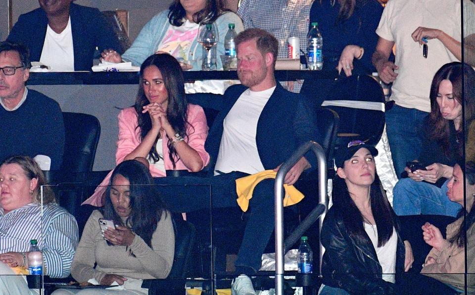 Meghan and Harry at a basketball game in Los Angeles - Getty