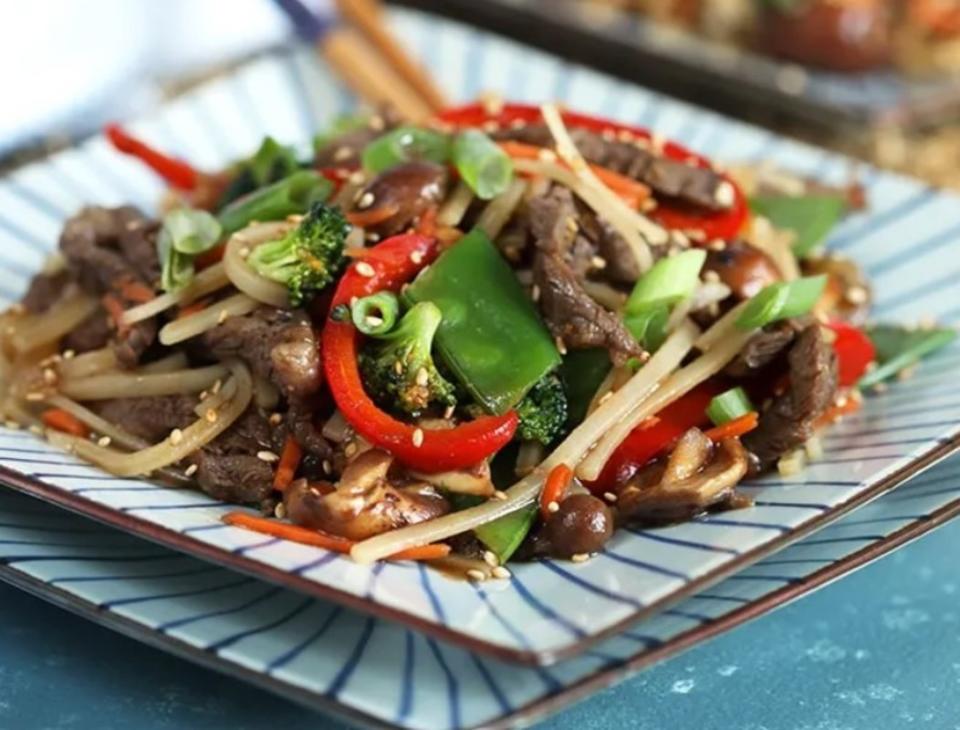 <p>The Suburban Soapbox</p><p><strong>Get the recipe: <a href="https://thesuburbansoapbox.com/easy-beef-stir-fry-with-rice-noodles" rel="nofollow noopener" target="_blank" data-ylk="slk:Easy Beef Stir Fry With Rice Noodles;elm:context_link;itc:0;sec:content-canvas" class="link ">Easy Beef Stir Fry With Rice Noodles</a></strong></p>