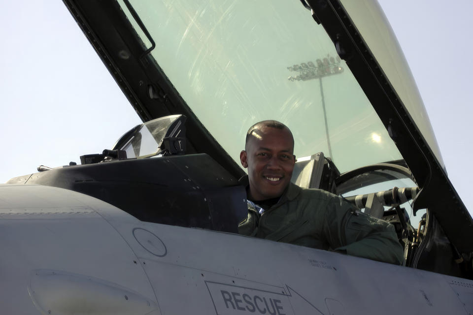 In this image provided by the U.S. Air Force, Col. CQ Brown, Jr., pilots an aircraft at Nellis Air Force Base, Nev., in 2006. Brown served as Weapons School Commandant from July 2005 to May 2007 at Nellis Air Force Base. (U.S. Air Force via AP)