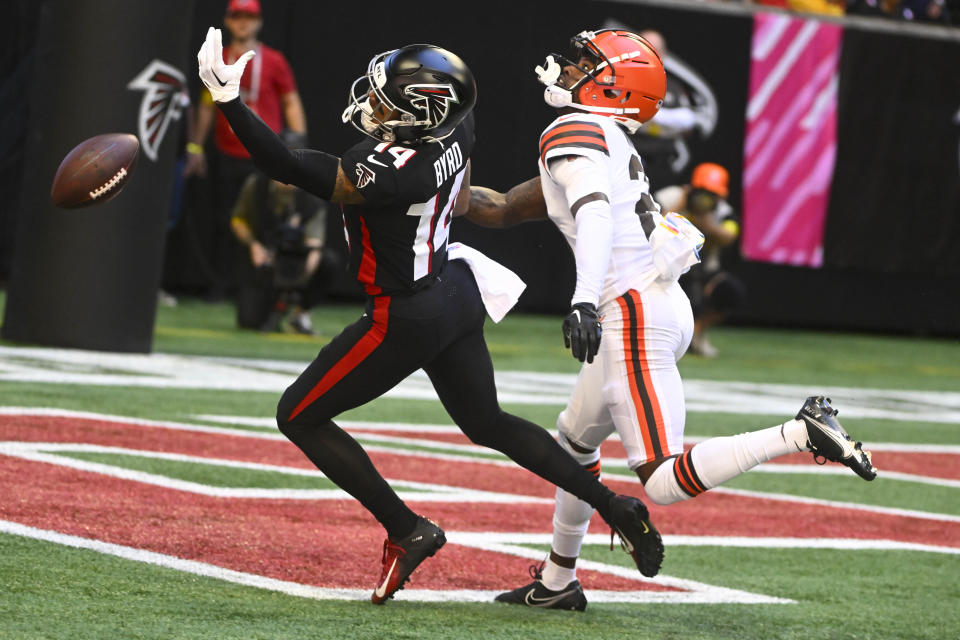 Atlanta Falcons wide receiver Damiere Byrd (14) misses the catch against Cleveland Browns cornerback Denzel Ward (21) during the first half of an NFL football game, Sunday, Oct. 2, 2022, in Atlanta. (AP Photo/John Amis)