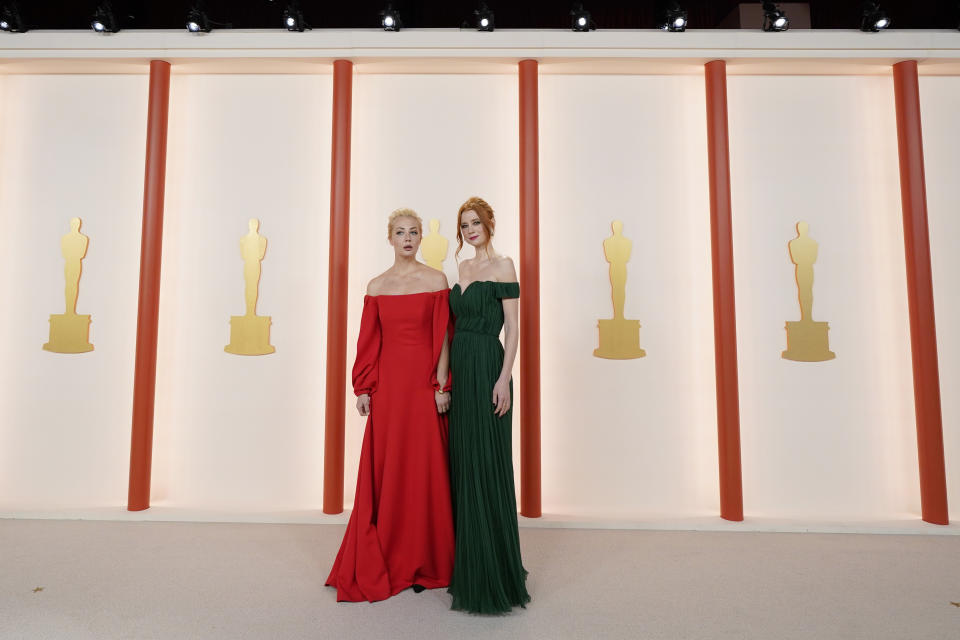 Yulia Navalnaya, left, and Odessa Rae arrives at the Oscars on Sunday, March 12, 2023, at the Dolby Theatre in Los Angeles. (AP Photo/Ashley Landis)