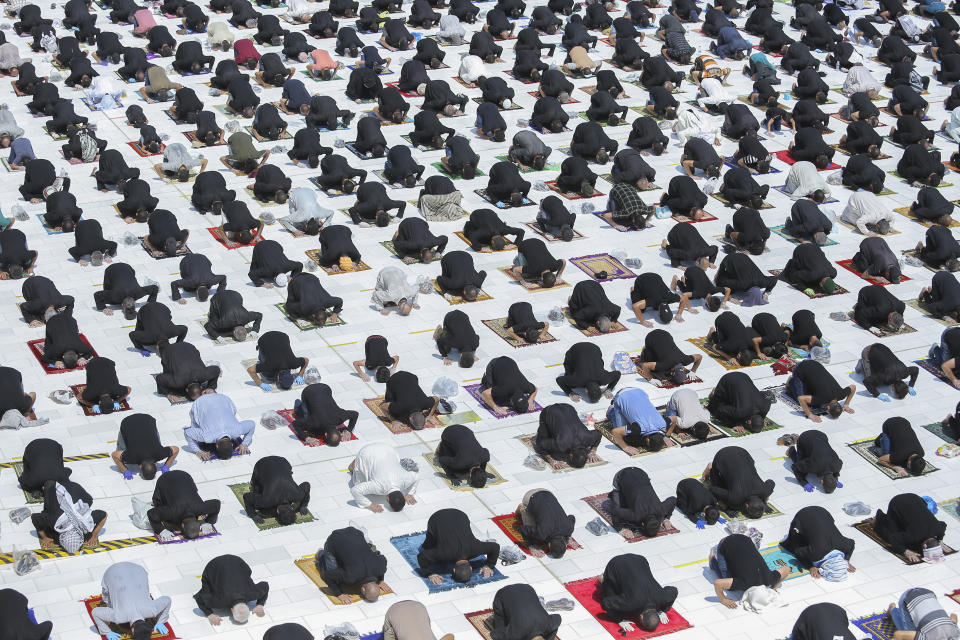 File - In this Friday, Sept. 11, 2020 file photo, Shiites attend a prayer or the first time in months since the restrictions were imposed to prevent the spread of the coronavirus at a mosque in Kufa, Iraq. (AP Photo/Anmar Khalil, File)