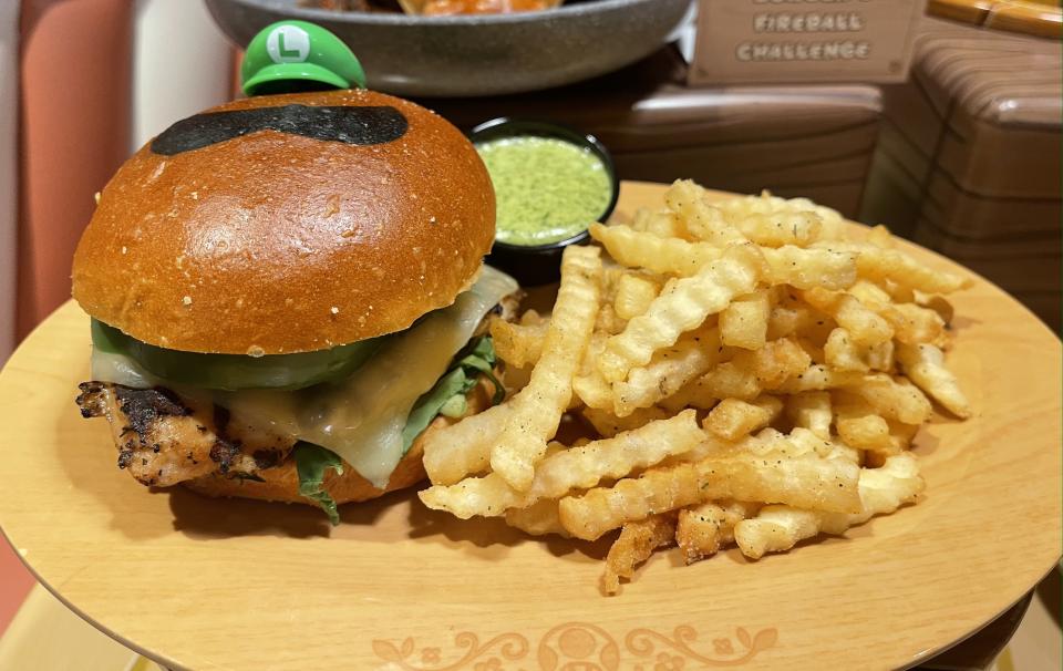 One of the best things about this Luigi-themed chicken sandwich is the pesto sauce on top. (Photo: Carly Caramanna)