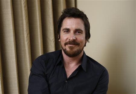 British actor Christian Bale poses for a portrait while promoting his upcoming movie "Out of the Furnace" in Los Angeles, California November 16, 2013. REUTERS/Mario Anzuoni