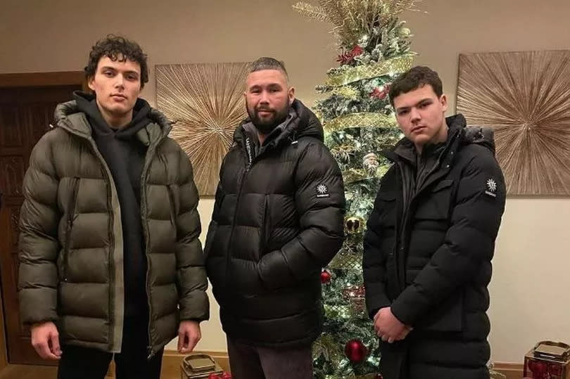 Tony Bellew with two of his four sons during the festive period