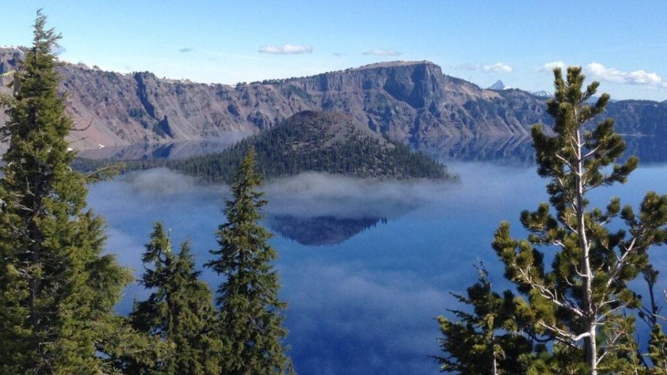 Crater Lake National Park showcases mountains and water in the West.