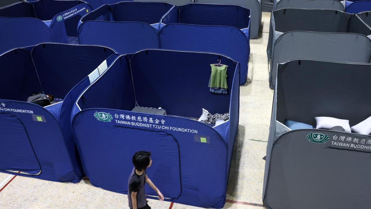 Tents for local residents evacuated following an earthquake are seen at a temporary centre at an elementary school in Hualien on April 6. Picture: I-Hwa Cheng / AFP