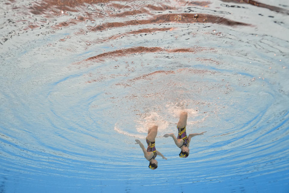 Thea Grima Buttigieg and Emily Ruggier of Malta compete in the women's duet technical of artistic swimming at the World Aquatics Championships in Doha, Qatar, Friday, Feb. 2, 2024. (AP Photo/Lee Jin-man)