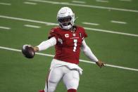 Arizona Cardinals' Kyler Murray celebrates running the ball for a touchdown in the second half of an NFL football game against the Dallas Cowboys in Arlington, Texas, Monday, Oct. 19, 2020. (AP Photo/Michael Ainsworth)