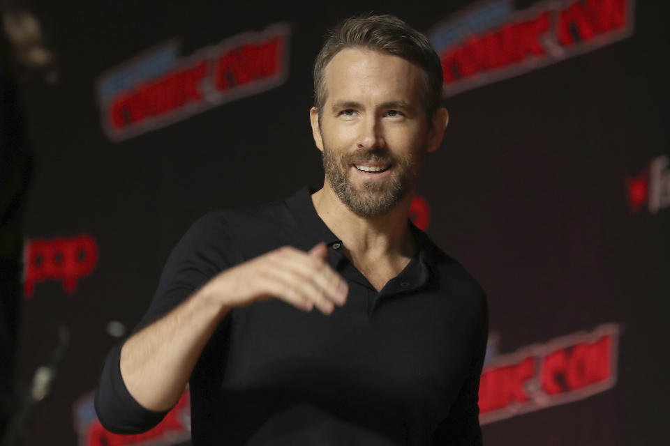 FILE - This Oct. 3, 2019 file photo shows Ryan Reynolds at New York Comic Con. Hollywood actors Ryan Reynolds and Rob McElhenney are officially the new owners of Welsh soccer club Wrexham, according to a formal takeover announcement Wednesday Feb. 10, 2021, (AP Photo/Steve Luciano, File)