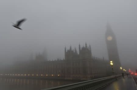 The Houses of Parliament are seen on a misty morning in London, in Britain, November 2, 2015. Airports across Britain suffered disruption on Monday as heavy fog led to delays and cancellations for a second day. REUTERS/Toby Melville