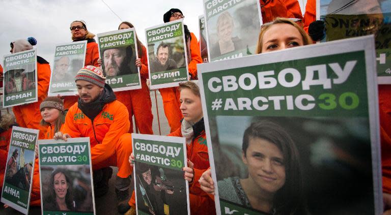 Greenpeace supporters protest in Moscow on October 5, 2013, in support of 30 activists held by Russia