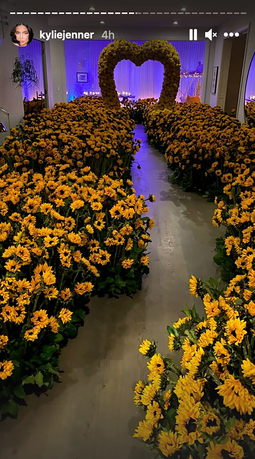 <p>In one room, sunflowers led the way to a cozy candlelit spot for the family of three to relax.</p>