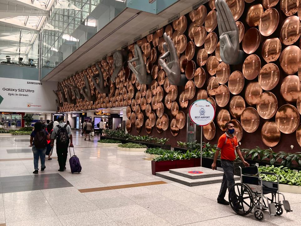 Mudras (hand gestures used in Indian classical dance, Buddhist meditation and yoga) are displayed along a wall at Indira Gandhi International Airport, also known as Delhi Airport, in Delhi, India.