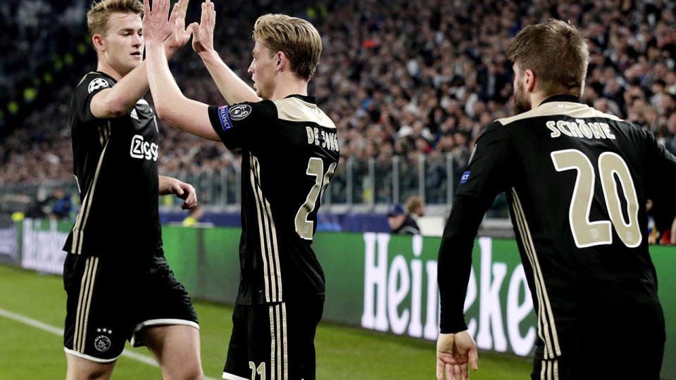 Matthijs de Ligt, Frenkie de Jong and Lasse Schone celebrate. (Photo by Erwin Spek/Soccrates/Getty Images)