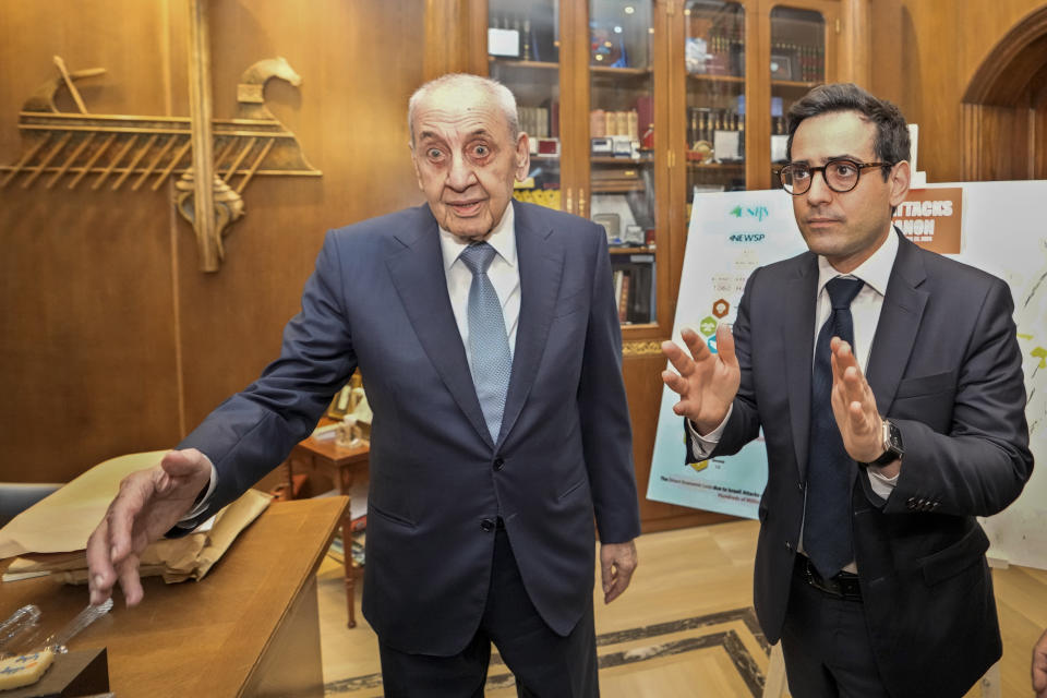 Lebanese Parliament Speaker Nabih Berri, right, gestures after he shows a map that details Israel's strikes on Lebanon since Oct. 7, to visiting French Foreign Minister Stephane Sejourne during their meeting, in Beirut, Lebanon, Sunday, April 28, 2024. (AP Photo/Hassan Ammar)