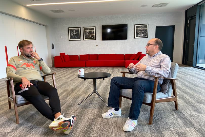 Paul Amann, founder of Liverpool FCs LGBT+ supporters group, Kop Outs, with Jurgen Klopp