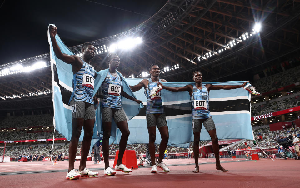 Four runners in Team Botswana Men's Relay