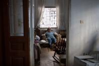 The Wider Image: 'We lost everything:' Grieving Beirut neighbourhood struggles to rebuild