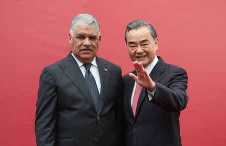 China's Foreign Minister Wang Yi and Dominican Republic's Chancellor Miguel Vargas pose during the opening of the first Chinese Embassy in the Dominican Republic, in Santo Domingo, Dominican Republic, September 21, 2018. REUTERS/Ricardo Rojas