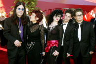 Musician Ozzy Osbourne (L) arrives with his family for the 54th annual Emmy Awards in Los Angeles September 22, 2002. From left are Ozzy, wife Sharon and children Kelly, Robert and Jack. REUTERS/Fred Prouser RG