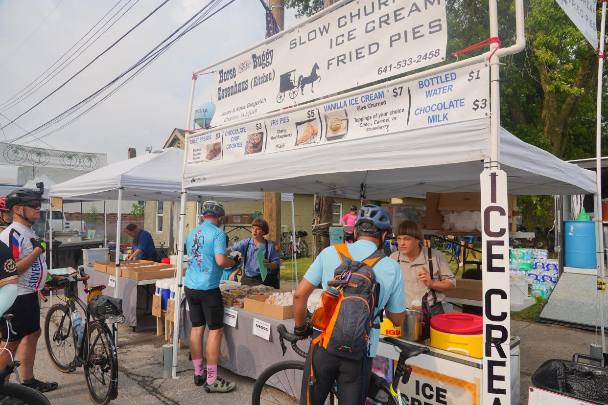 Riders top at the Horse and Buggy Essenhaus Amish pie stand in Lovilia as RAGBRAI heads to Ottumwa, Thursday, July 25, 2024.