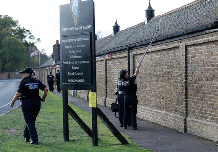 Police officers perform a search a day ahead of the royal wedding between Princess Eugenie and Jack Brooksbank in Windsor, Britain, October 11, 2018. REUTERS/Peter Nicholls