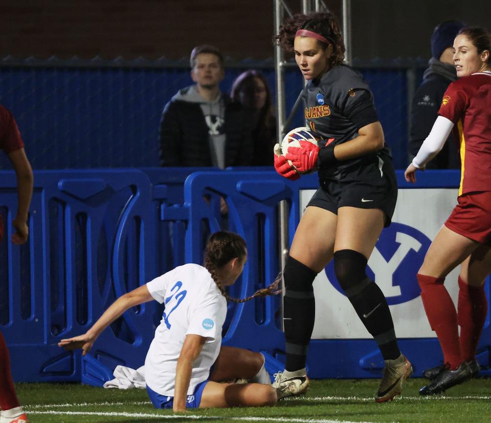 USC goalkeeper Hannah Dickinson (1) and BYU midfielder Bella Folino (22) collide during the second round of the NCAA championship in Provo on Thursday, Nov. 16, 2023. BYU won 1-0. | Jeffrey D. Allred, Deseret News