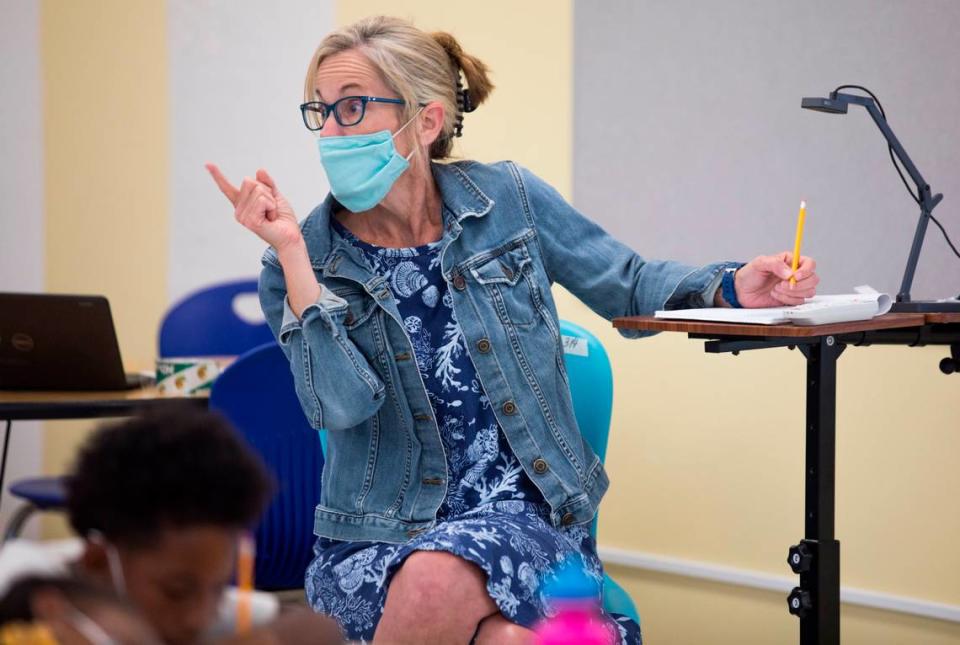 Tracie Humphries, who teaches second grade at Mangum Elementary School during the regular school year, instructs students in math during a summer learning class at Eno Valley Elementary School in Durham, N.C. on Monday, June 21, 2021.