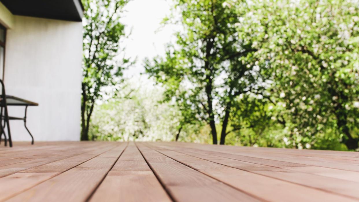  Cleaned deck, trees in background 