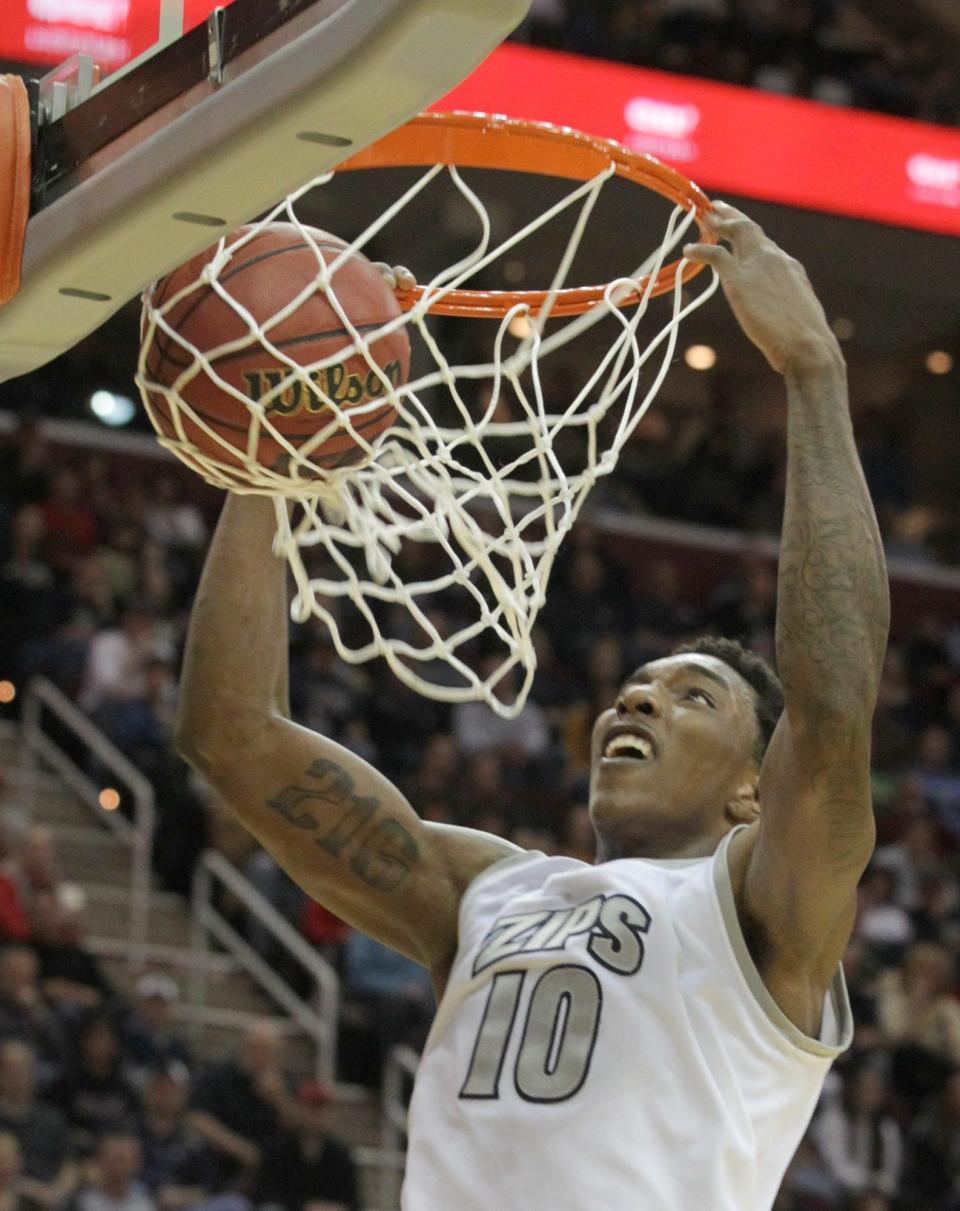 Akron's Nick Harney puts down a dunk against Ohio in the Mid-American Conference Championship game on March 16, 2013.