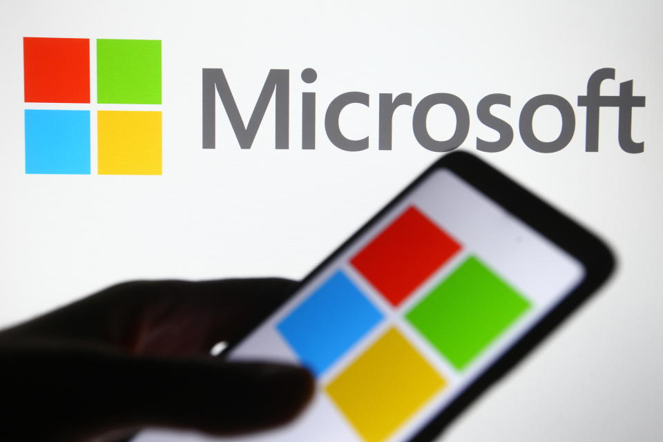 UKRAINE - 2021/02/05: In this photo illustration a Microsoft logo is seen on a mobile phone and a pc screen. (Photo Illustration by Pavlo Gonchar/SOPA Images/LightRocket via Getty Images)