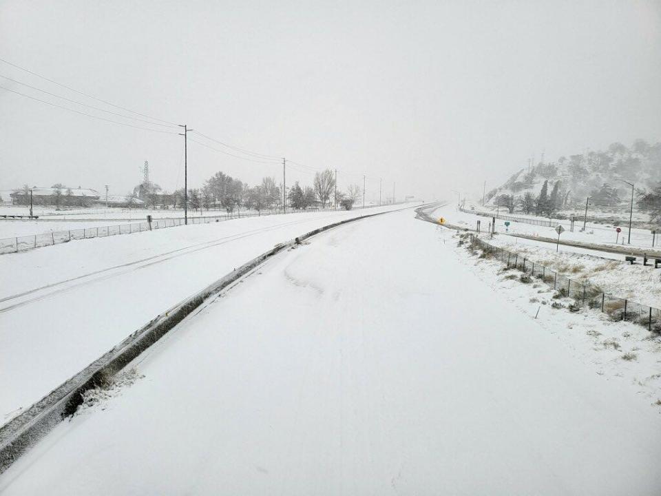 The California Highway Patrol posted photos of a snow-covered Grapevine on the morning of Feb. 24, 2023.