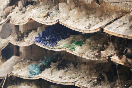 Melted bottles are seen at a liquor store destroyed by the Camp Fire in Paradise, California, U.S. November 9, 2018. REUTERS/Stephen Lam