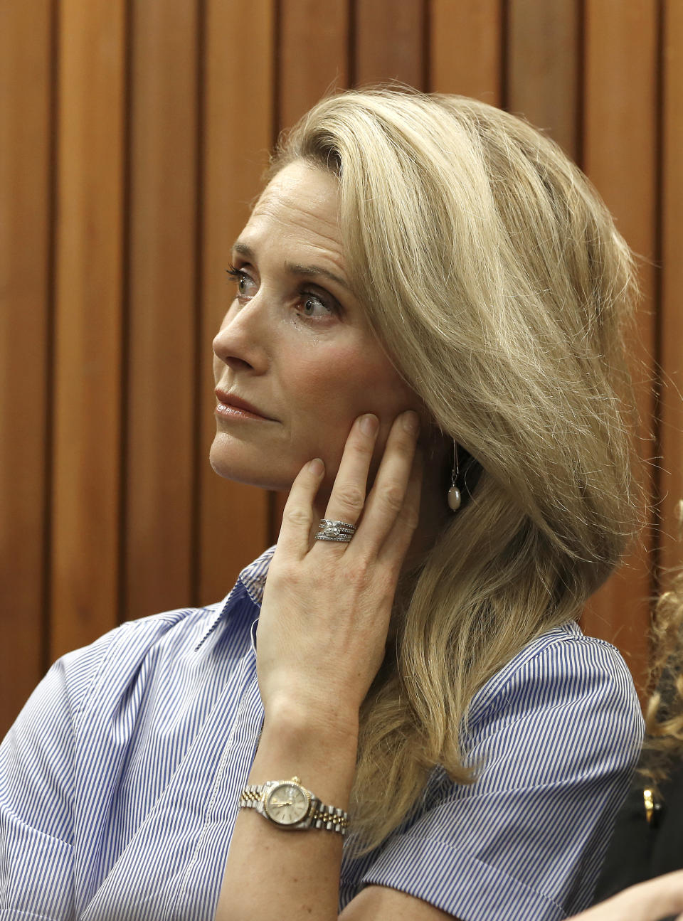 FILE - Jennifer Siebel Newsom listens as her husband, Gov. Gavin Newsom, discusses his revised state budget during a news conference on May 9, 2019, in Sacramento, Calif. Siebel Newsom, a documentary filmmaker and the wife of California governor Gavin Newsom, has taken the stand at the trial of Harvey Weinstein. Newsom is the fourth of the women Weinstein is accused of assaulting to testify at his Los Angeles trial. (AP Photo/Rich Pedroncelli, File)